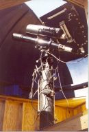 Inside looking up at the telescope and at the rear of the dome.